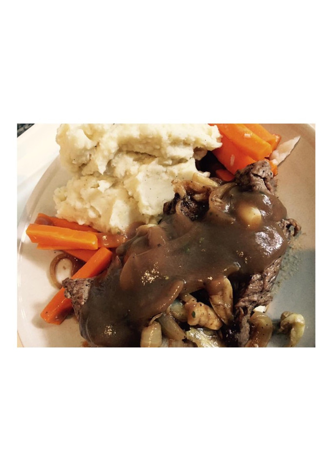 A picture of Beef steak with mashed potato.