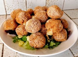 Foto di Polpette di polenta avanzata con cuore filante al formaggio