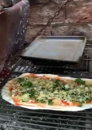 Una foto de Pizzas a la parrilla
