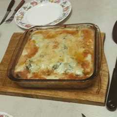 Una foto de Brócoli con salsa bechamel (blanca)