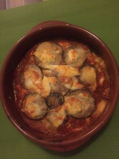 Una foto de Berenjenas a la parmesana