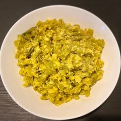 A picture of Snake gourd curry.