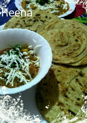 A picture of Paneer with lacha paratha.