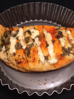 A picture of Cheesy garlic bread.