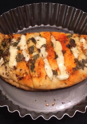 A picture of Cheesy garlic bread.