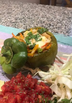 Una foto de PIMIENTOS RELLENOS con vegetales y arroz integral 🫑🥕🌽🧅