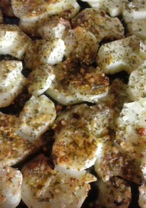 Una foto de Papas condimentadas al horno eléctrico