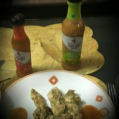 A picture of Chicken with peri peri sauce.