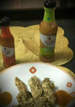 A picture of Chicken with peri peri sauce.