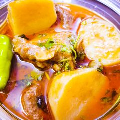 A picture of Aloo Gosht.