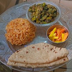 A picture of Mula Bhaji & Brinjal Sabzi(Radish Greens & Eggplant Curry).