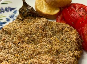 Una foto de Berenjena apanada en airfryer