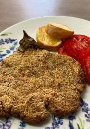 Una foto de Berenjena apanada en airfryer
