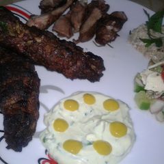 A picture of Barbecues kebab and marinated steak.