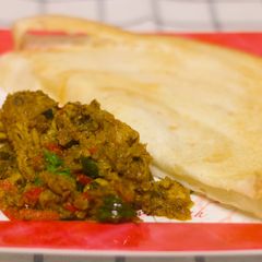 A picture of Chicken sautéed with Red capsicum.
