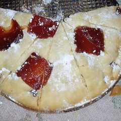 A picture of Torta con Dulce de membrillo.
