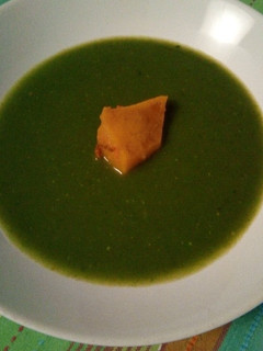 Una foto de Crema de verduras con perla de calabaza asada