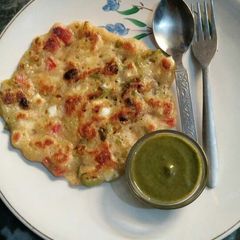 A picture of Rice flour veg & dryfruits Uttapam.