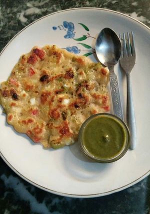 A picture of Rice flour veg & dryfruits Uttapam.