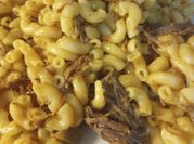 A picture of macaroni with ketchup