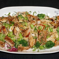 A picture of Asian grilled chicken with edamame salad.