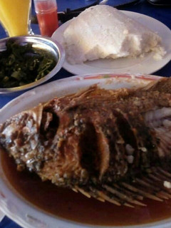 A picture of Fried fish With ugali.