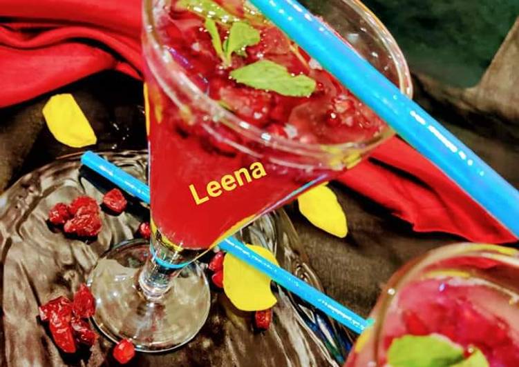 Holiday Mojito Cocktail with Cranberry and Pomegranate Holiday Mojito Cocktail with Cranberry and Pomegranate