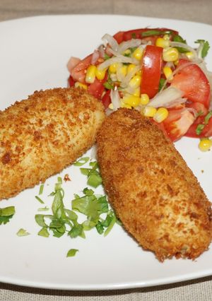 A picture of Chilean stuffed potatoes with beef.