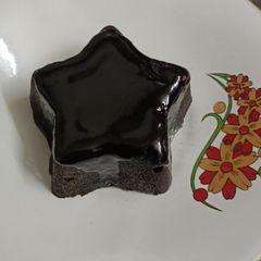A picture of Choco lava topped with Ganache.