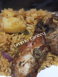 Jollof din shinkafa, dankalin turawa da Naman kaza ainihin hoton girkin
