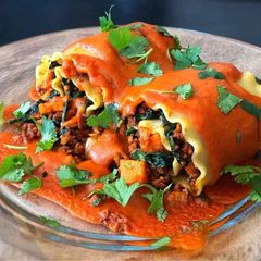 A picture of Vegan Plant Based Chorizo, Sweet Potato & Spinach Rollatas with Spicy Coconut Indian Curry Sauce.