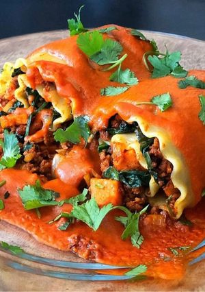 A picture of Vegan Plant Based Chorizo, Sweet Potato & Spinach Rollatas with Spicy Coconut Indian Curry Sauce.