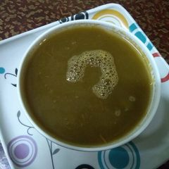 A picture of Tomato spinach soup.