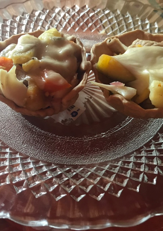Una foto de Canastita rellena de cerdo y verduras