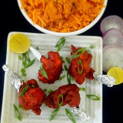 A picture of Restaurant style chicken lollipop.