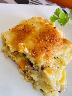 Una foto de Brazo de patata y carne gratinado