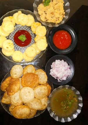 A picture of Dal coin with Pani Puri.
