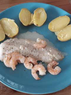 Una foto de Filetes de Merluza con Langostinos