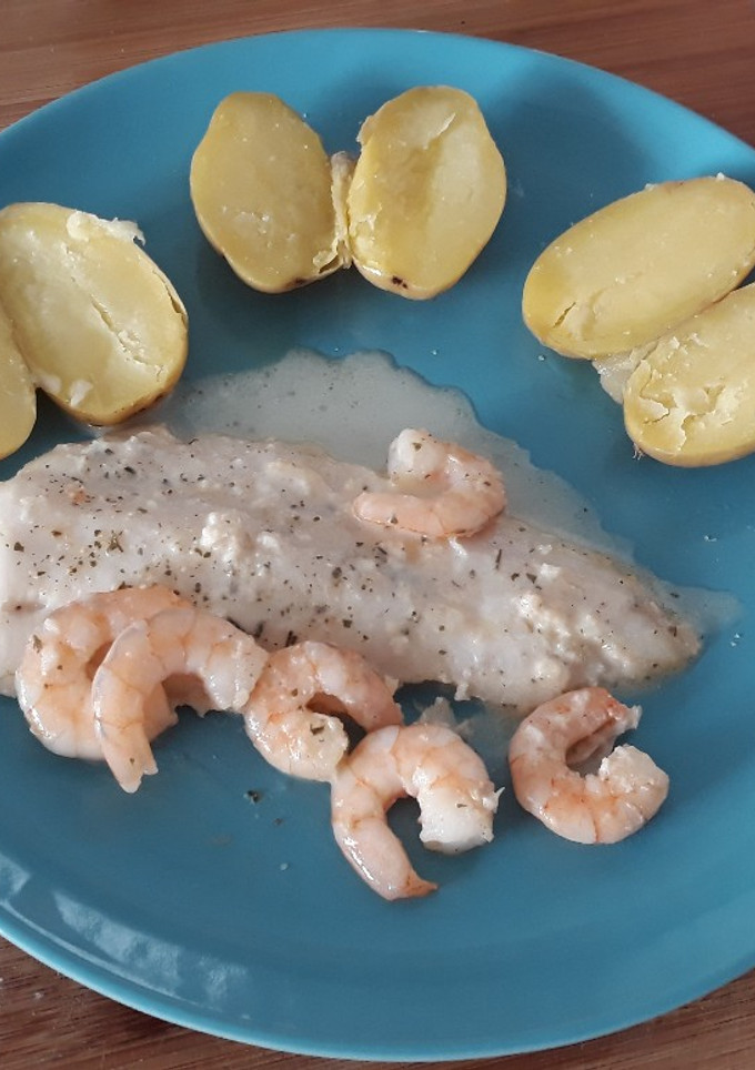 Una foto de Filetes de Merluza con Langostinos