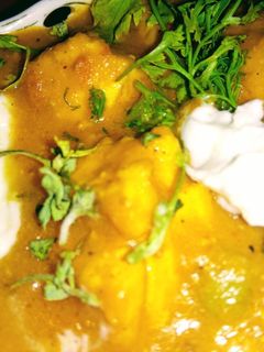 A picture of Paneer Butter Masala (cottage cheese).