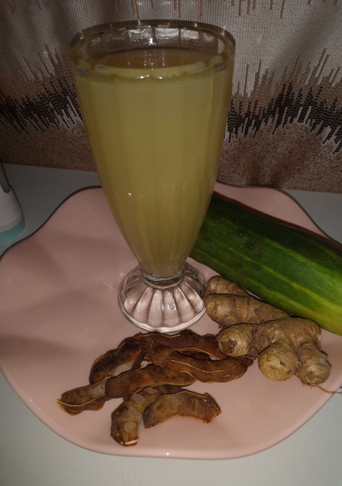 A picture of Cucumber, ginger and tamarind juice.