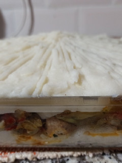 Una foto de Pastel de pollo, repollo y papa