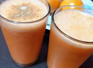 Una foto de Jugo de Naranja zanahoria y jengibre