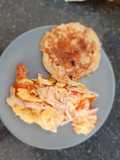 Tortilla con tomate gratinada