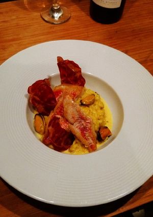 Une photo de Risotto safrané roujetscuit à l unilatérale ships de coppa