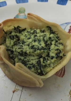 Una foto de Canastitas de espinaca y ricota