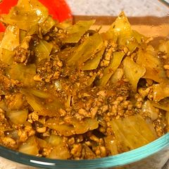 A picture of Cabbage and ground meat.