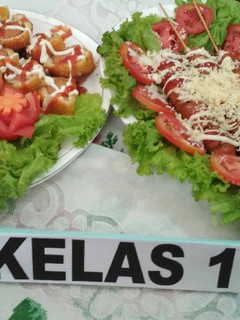 Foto resep Sosis gulung roti tawar dg toping keju