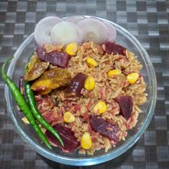 A picture of Beetroot -Corn Pulao.