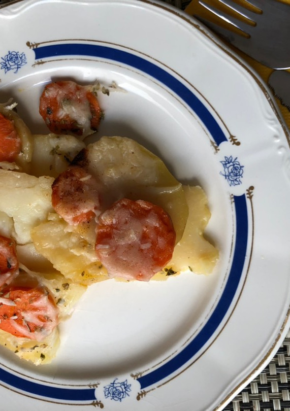 Una foto de Patatas gratinadas con “queso Mahón”